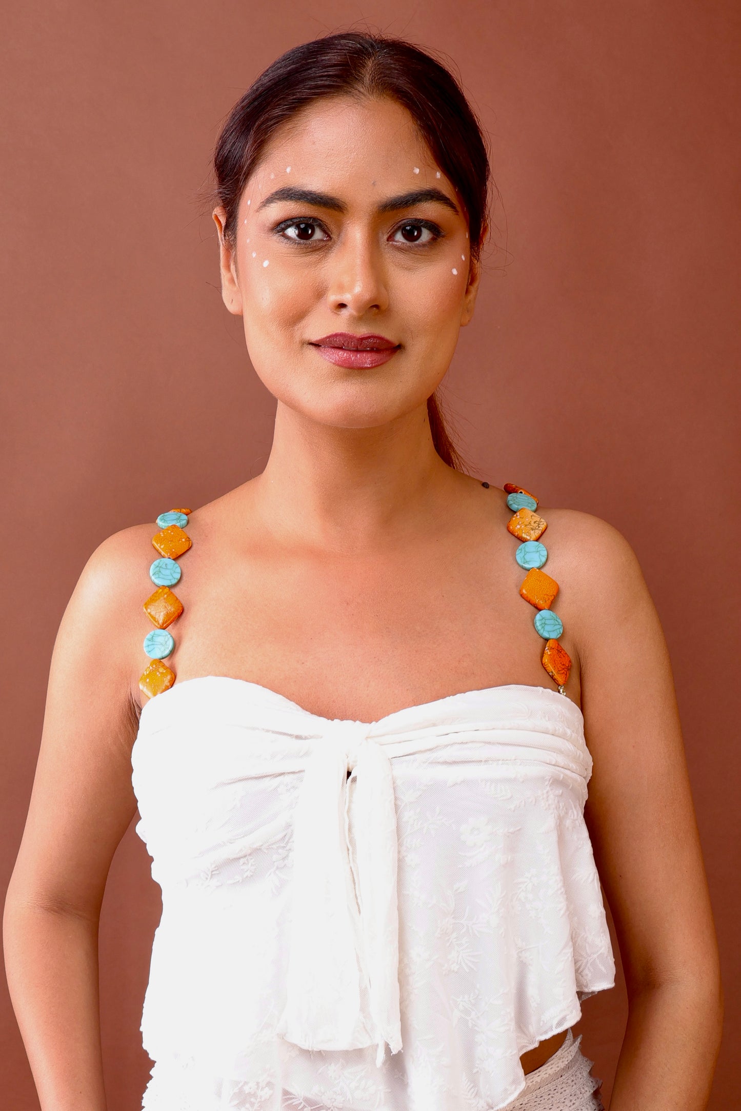 Tangy turquoise beaded bra strap