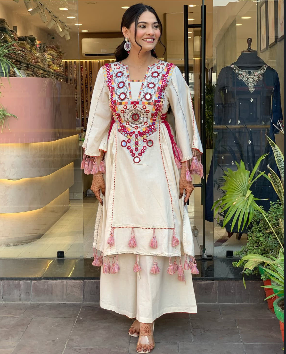 Designer Peplum & Bell Bottom Set with Real mirror work With Tassels and Lace work.
