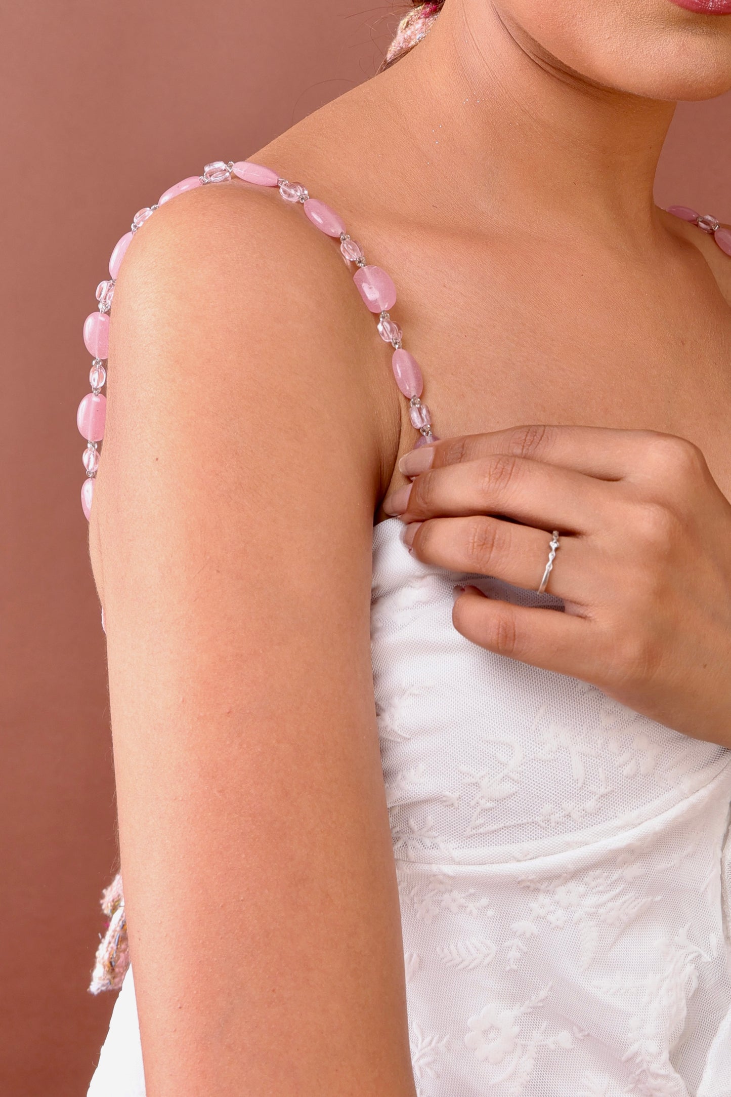 Pastel pink beaded bra strap