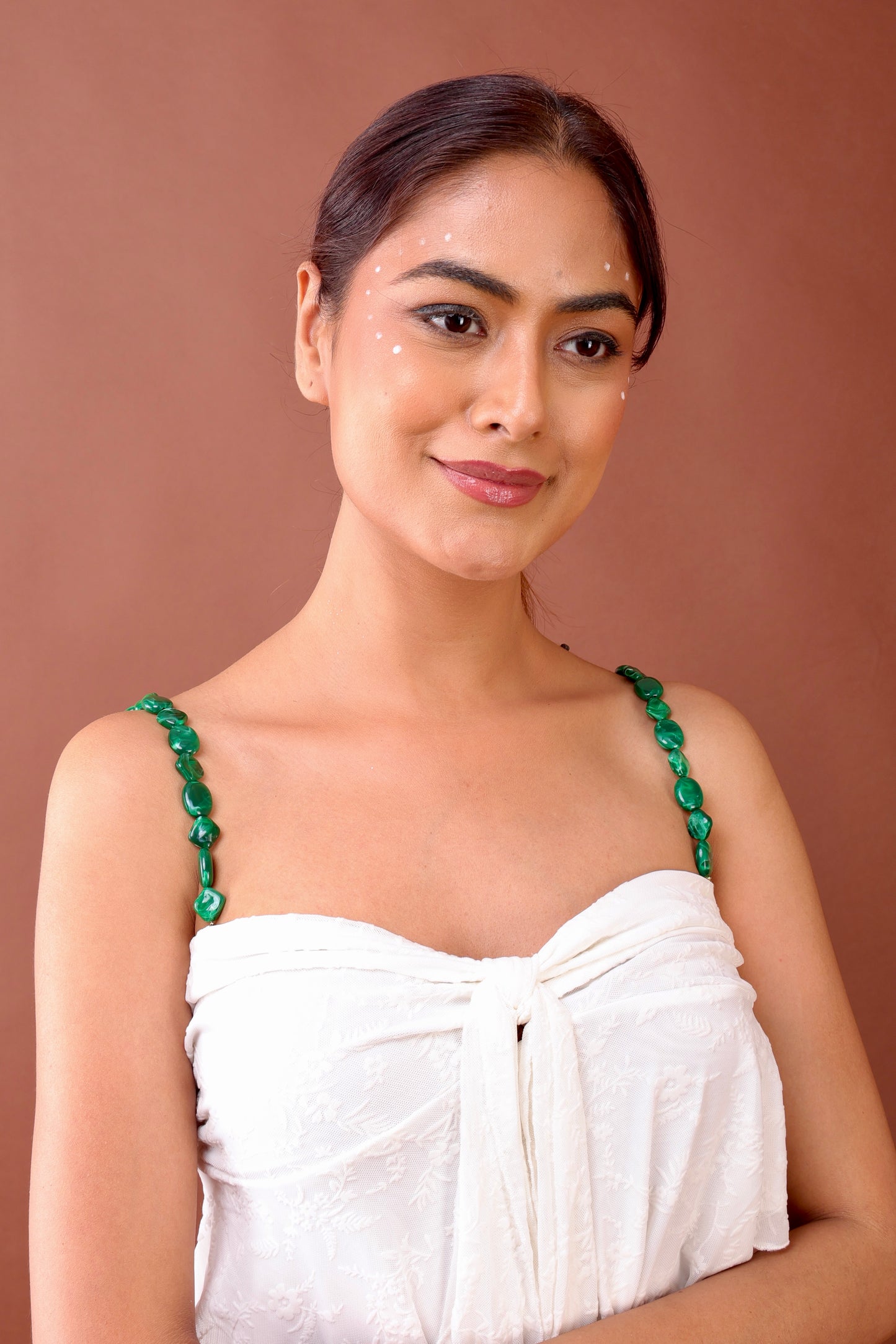 Green beaded bra strap