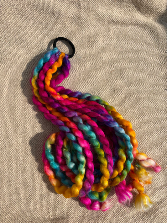 Holi 2026 - Colorful hair strands